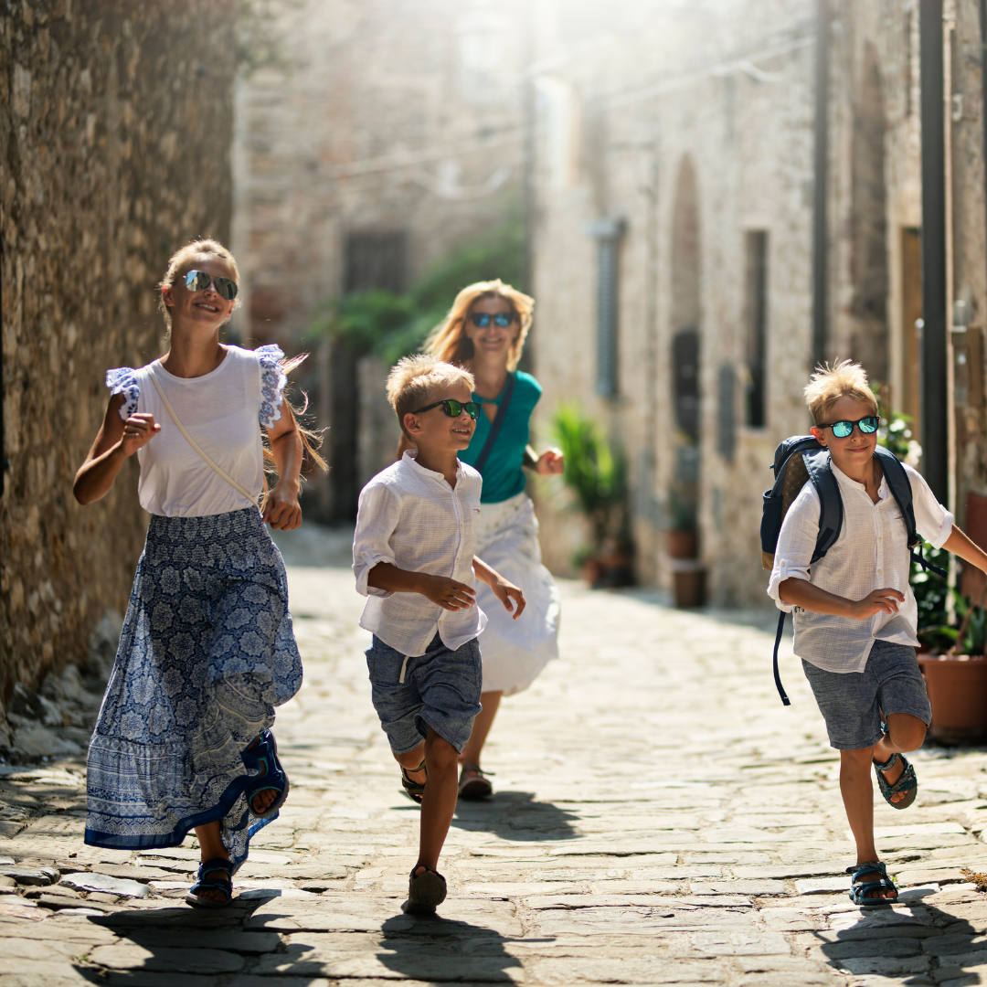 family living in italy running down trip smiling